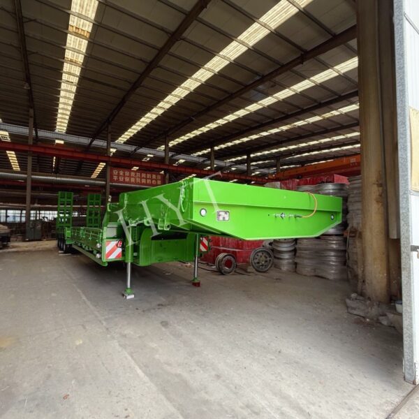4-axis green pull-out low bed semi-trailer - Image 4