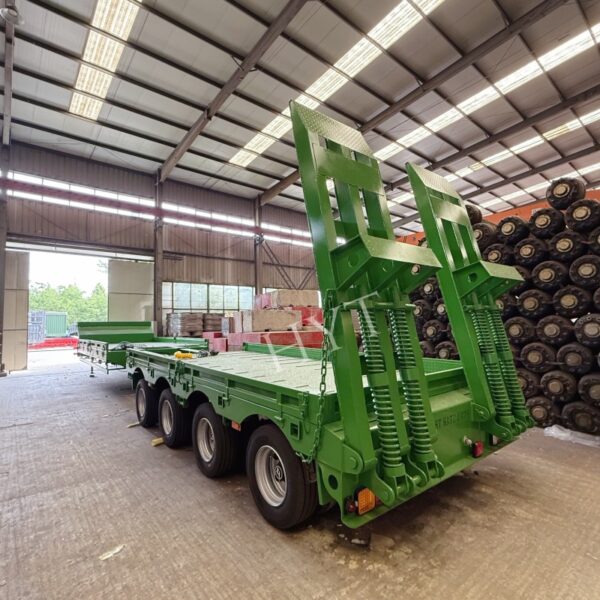4-axis green pull-out low bed semi-trailer - Image 5