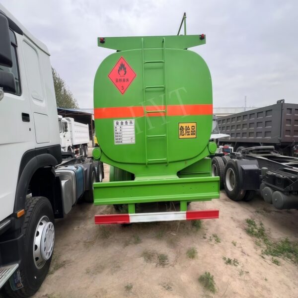 Green 2-axle oil tanker truck - Image 3